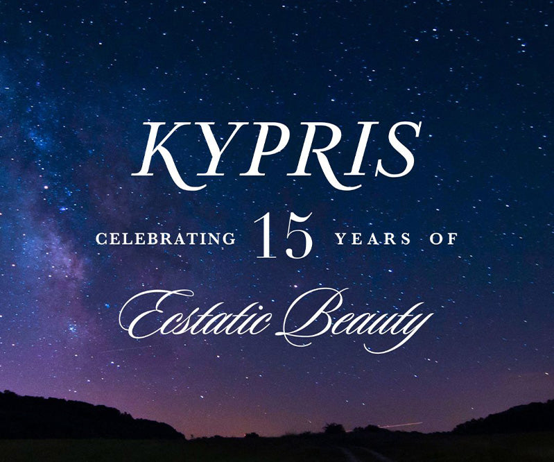 KYPRIS Celebrating 15 Years of Ecstatic Beauty against starry night sky