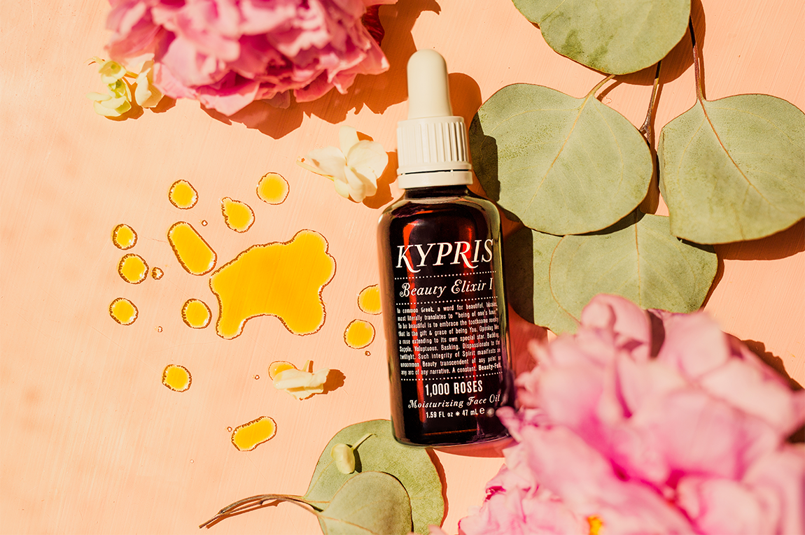 KYPRIS Beauty Elixir I 1,000 Roses Moisturizing Face Oil 1.59 fl oz with pink peonies and eucalyptus leaves