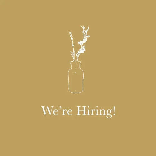 We're Hiring! with white floral illustration on gold background