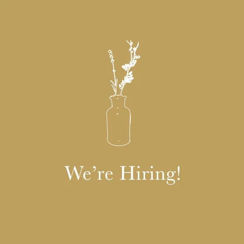 We're Hiring! with white floral illustration on gold background