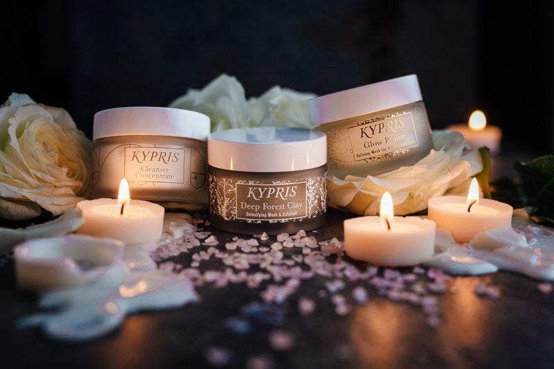 KYPRIS Deep Forest Clay Detoxifying Mask & Exfoliant with candles and white roses