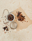 Hibiscus & Rosehip Tea  on marble surface.