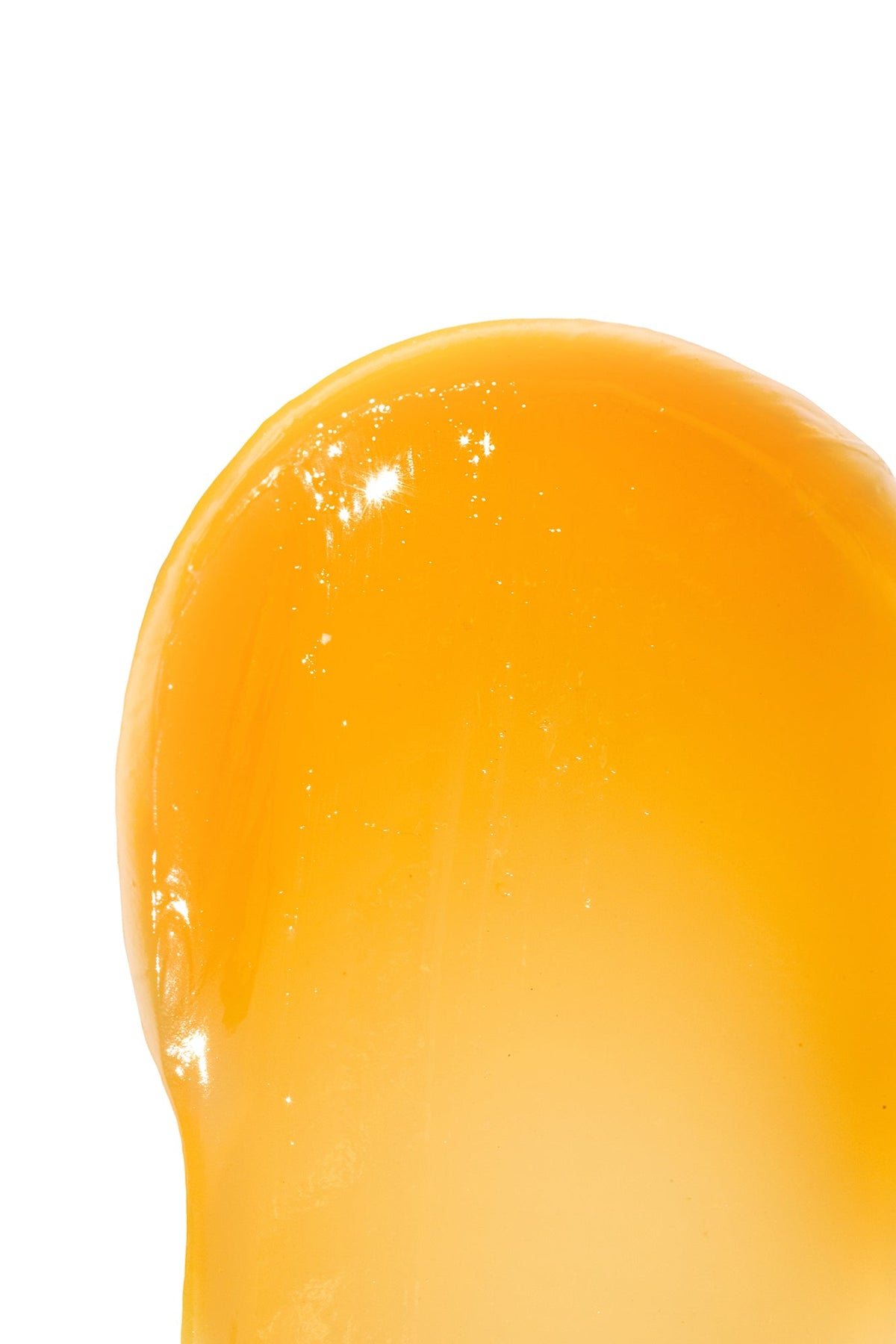 Lip Balm Elixir, golden gel texture.