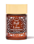 Puff of Love Moisturizer, in amber glass jar with gold lid, on white background.