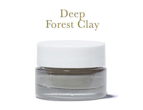 Deep Forest Clay Mask, in clear glass jar with white lid, on white background.