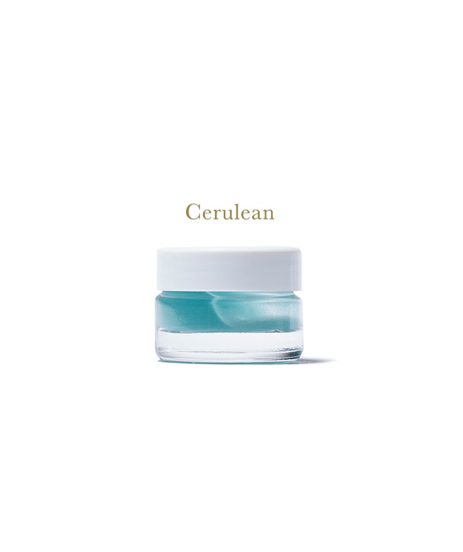 Cerulean mask in clear glass jar showing cerulean blue product color.